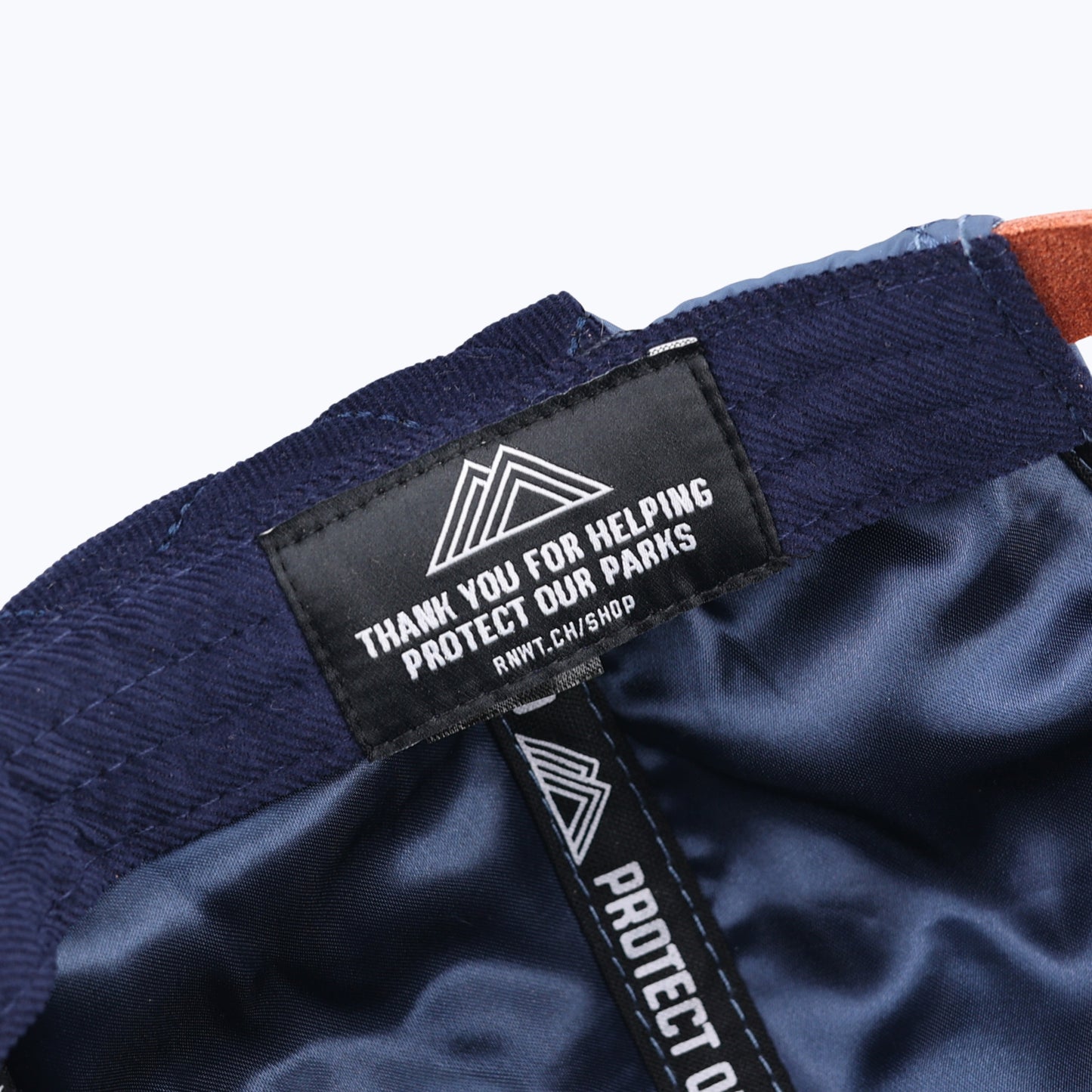 Protect Our Parks Bear 7 Panel Trapper Cap - Navy/Orange