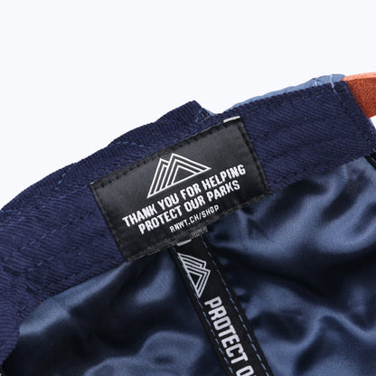 Protect Our Parks Bear 7 Panel Trapper Cap - Navy/Orange